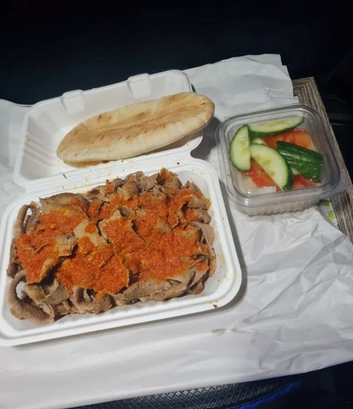 Doner Kebabs with Pitta Bread and Cucumbers and Tomatoes Served at Bodrum Grill House Felixstowe